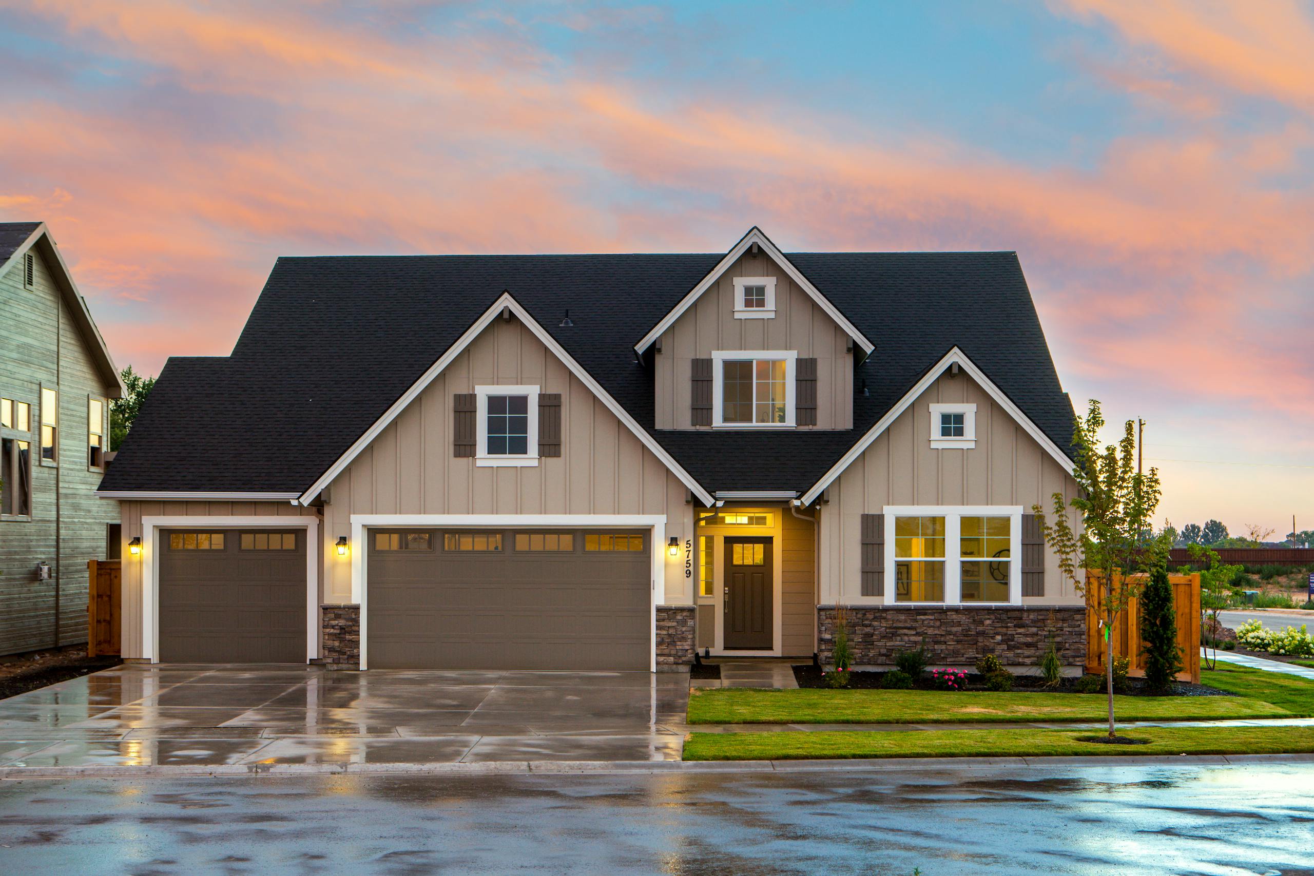 Charming family home with a modern facade and spacious garage.